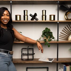 Endless Serenity Candle Co Founder in front of book shelf